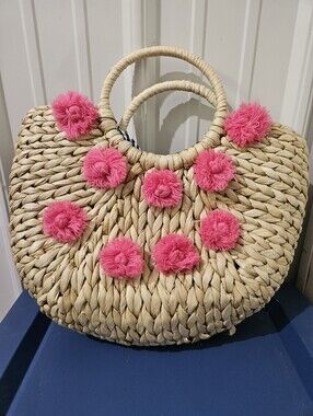 Woven Straw Tote with Pink Pom Pom Accents